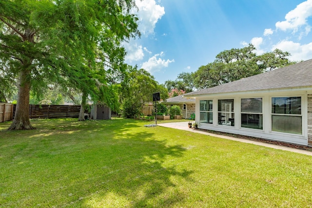 105 Pleasant Valley Dr, West Columbia, TX 77486 - fenced backyard with a storage unit