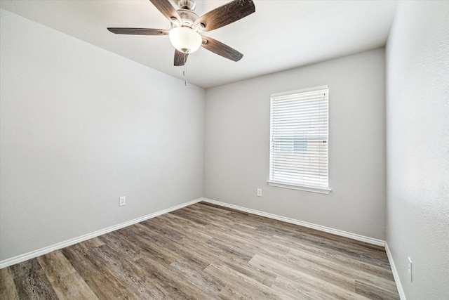 7110 Timber Post Ln, Humble, TX 77346 - spare room with wood finished floors and a ceiling fan