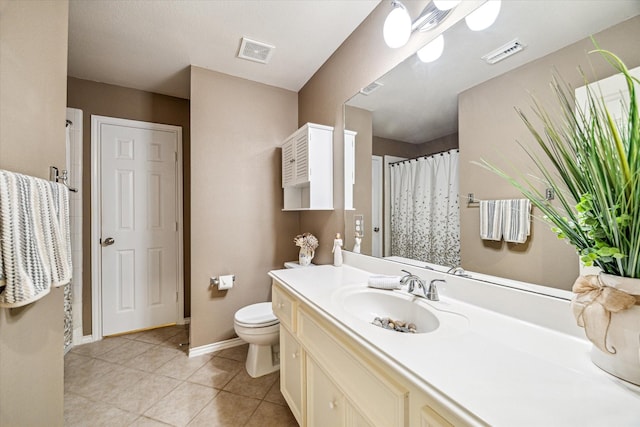 7110 Timber Post Ln, Humble, TX 77346 - bathroom featuring vanity, tile patterned flooring, and a shower with shower curtain