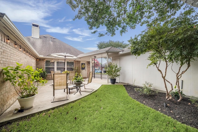 7110 Timber Post Ln, Humble, TX 77346 - view of yard featuring a patio area