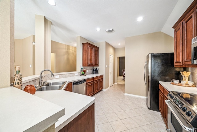 7110 Timber Post Ln, Humble, TX 77346 - kitchen with stainless steel appliances, light countertops, backsplash, light tile patterned flooring, and recessed lighting