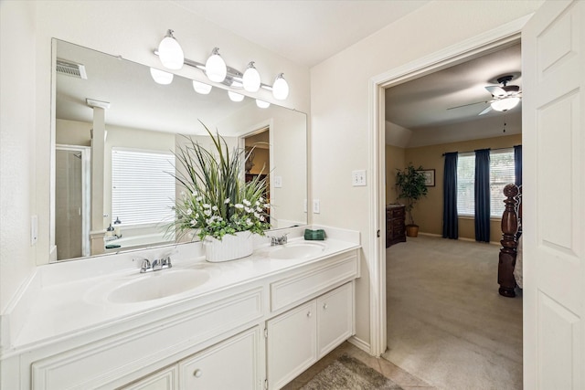 7110 Timber Post Ln, Humble, TX 77346 - full bathroom featuring double vanity, a shower stall, ceiling fan, and a garden tub