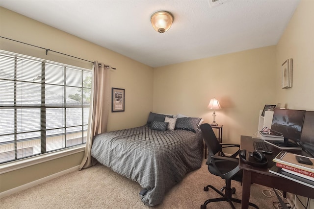 16219 Rainbow Lake Rd, Houston, TX 77095 - carpeted bedroom with baseboards and an office area