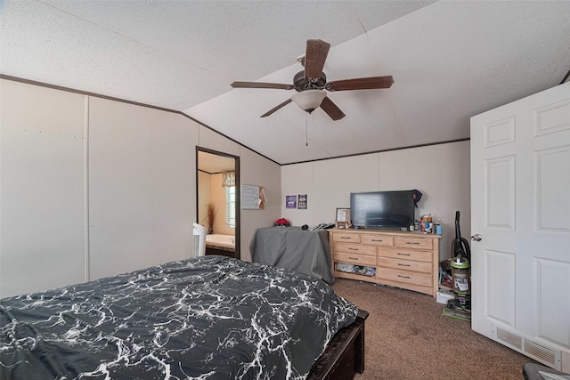 232 3rd St, Dickinson, TX 77539 - carpeted bedroom with lofted ceiling and a ceiling fan