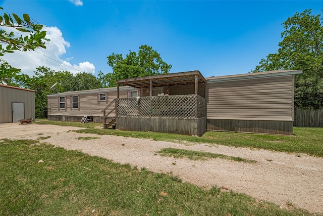 232 3rd St, Dickinson, TX 77539 - rear view of property with a lawn