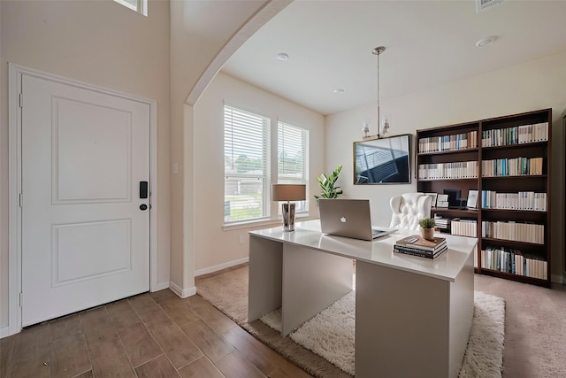 10023 Rose Mallow Ln, Magnolia, TX 77354 - office space featuring arched walkways and wood finished floors
