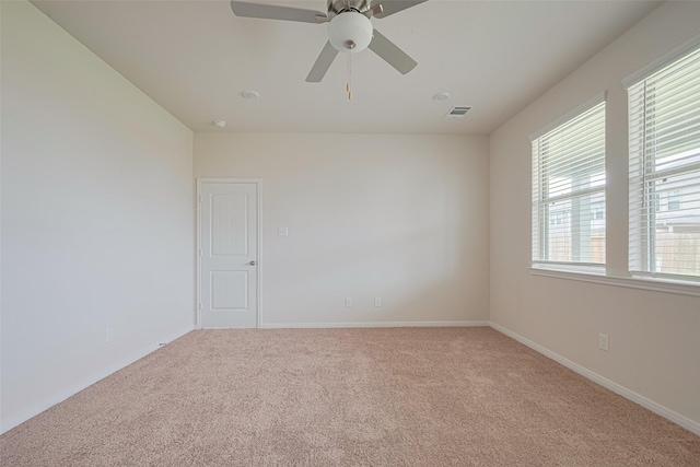 10023 Rose Mallow Ln, Magnolia, TX 77354 - spare room with light colored carpet and a ceiling fan