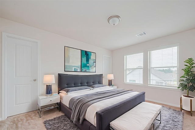 10023 Rose Mallow Ln, Magnolia, TX 77354 - bedroom with light colored carpet and baseboards