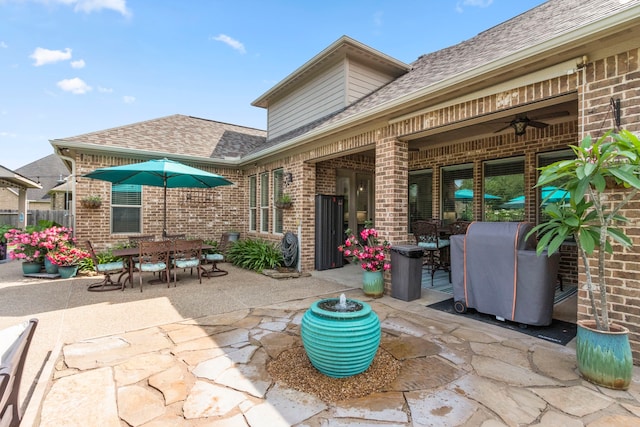 32226 Waterford Crest Ln, Fulshear, TX 77441 - view of patio featuring outdoor dining space and a ceiling fan