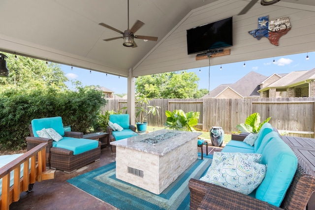 32226 Waterford Crest Ln, Fulshear, TX 77441 - fenced backyard with an outdoor living space with a fire pit, a ceiling fan, and a patio area