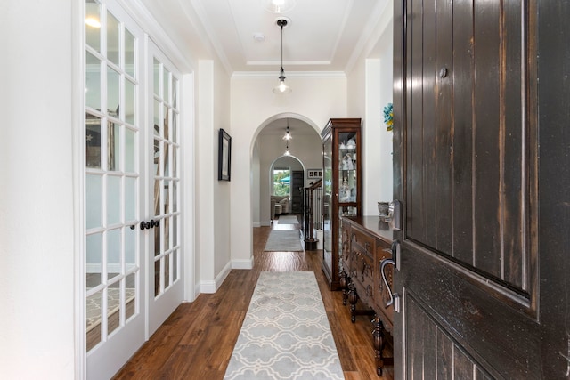 32226 Waterford Crest Ln, Fulshear, TX 77441 - entryway with arched walkways, dark wood-style flooring, french doors, and crown molding