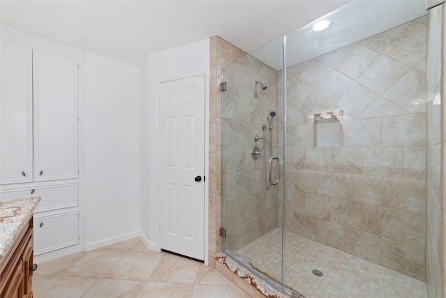 18307 Cransley Dr, Houston, TX 77084 - bathroom with vanity, a shower stall, and tile patterned floors
