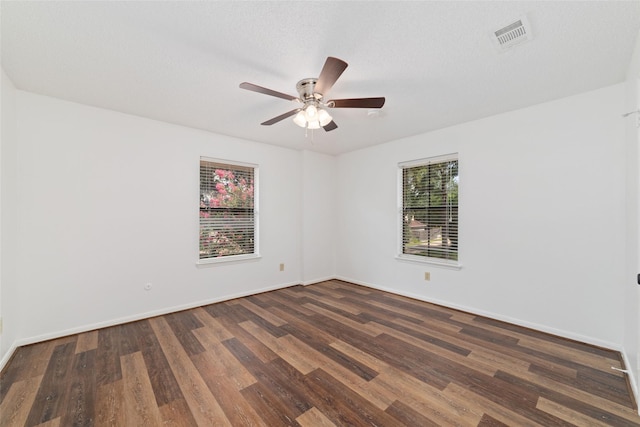 18307 Cransley Dr, Houston, TX 77084 - empty room with dark wood-style floors and ceiling fan