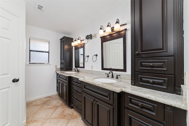 18307 Cransley Dr, Houston, TX 77084 - bathroom with double vanity and tile patterned floors