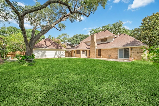 18307 Cransley Dr, Houston, TX 77084 - back of property with brick siding and a shingled roof