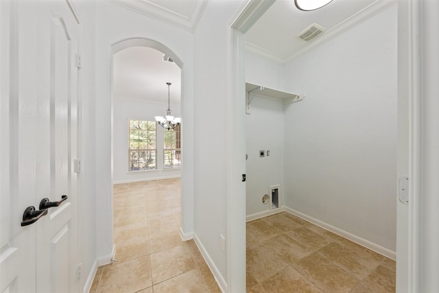 2642 Tacoma Springs Dr, Conroe, TX 77304 - laundry room with electric dryer hookup, crown molding, light tile patterned floors, a chandelier, and arched walkways