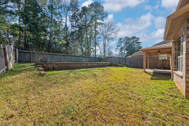 2642 Tacoma Springs Dr, Conroe, TX 77304 - fenced backyard featuring a patio