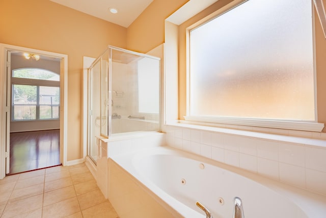 7907 Swan Hollow Ct, Houston, TX 77041 - full bath with a shower stall, a jetted tub, and tile patterned flooring