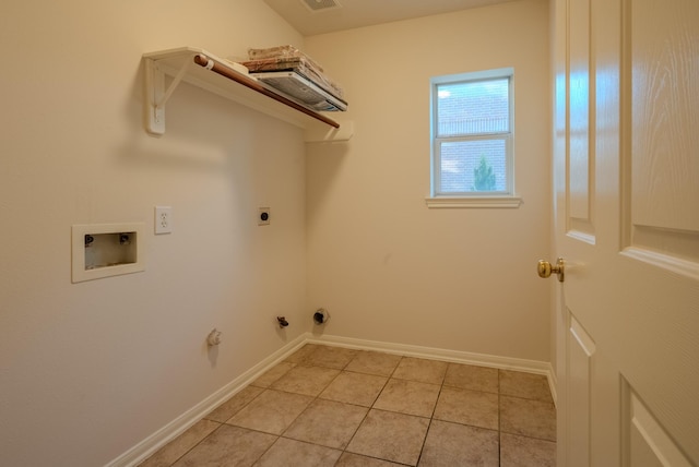 7907 Swan Hollow Ct, Houston, TX 77041 - laundry room with washer hookup, hookup for a gas dryer, light tile patterned flooring, and hookup for an electric dryer