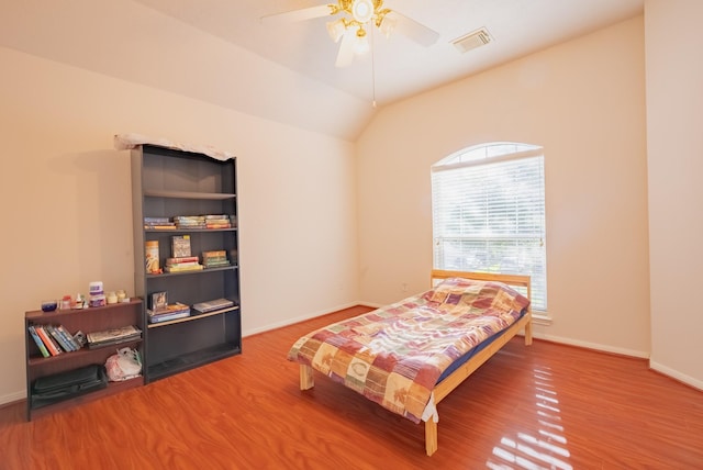 7907 Swan Hollow Ct, Houston, TX 77041 - bedroom with wood finished floors, ceiling fan, and lofted ceiling