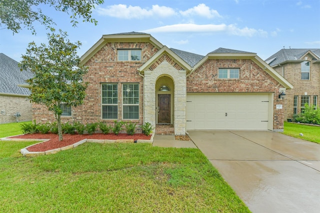 2012 Post Oak Ct, Pearland, TX 77581 - view of front of property featuring a front yard, driveway, an attached garage, and brick siding