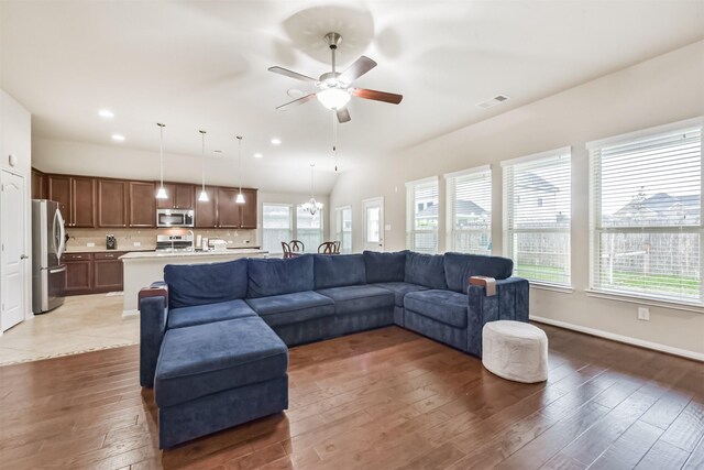 2012 Post Oak Ct, Pearland, TX 77581 - living area featuring hardwood / wood-style floors, a ceiling fan, and recessed lighting