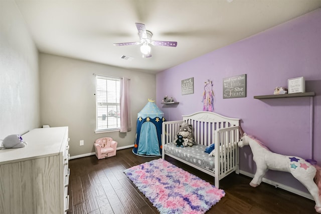 2012 Post Oak Ct, Pearland, TX 77581 - bedroom with wood finished floors, a nursery area, and a ceiling fan