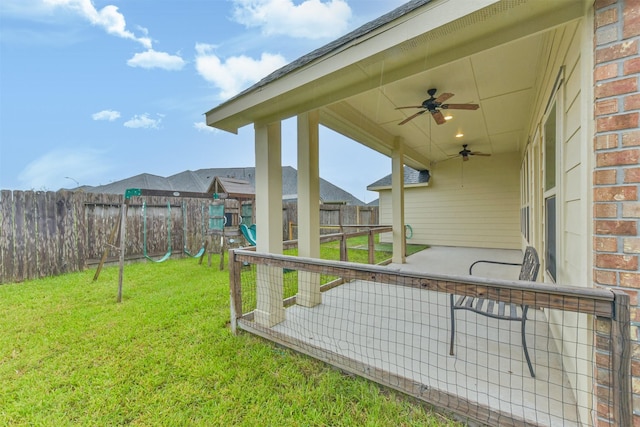 2012 Post Oak Ct, Pearland, TX 77581 - fenced backyard with a playground and ceiling fan
