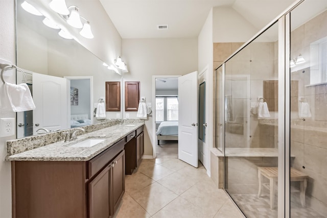 2012 Post Oak Ct, Pearland, TX 77581 - bathroom with ensuite bath, double vanity, tile patterned floors, and a stall shower
