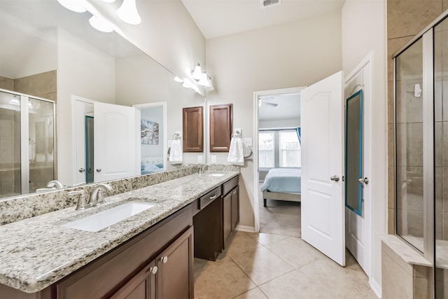 2012 Post Oak Ct, Pearland, TX 77581 - bathroom with ensuite bath, double vanity, a stall shower, and tile patterned floors