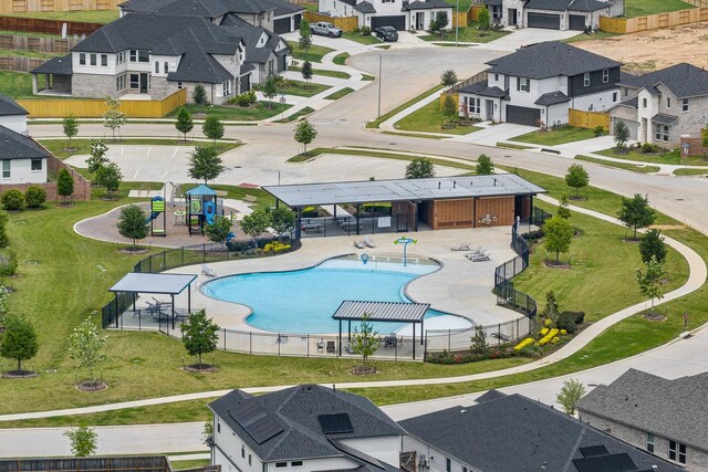 1219 Buffalo Run, Tomball, TX 77375 - aerial view of residential area featuring a pool area