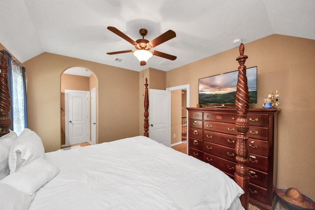 102 Stonecrop Pl, Montgomery, TX 77316 - bedroom featuring vaulted ceiling, arched walkways, and ceiling fan