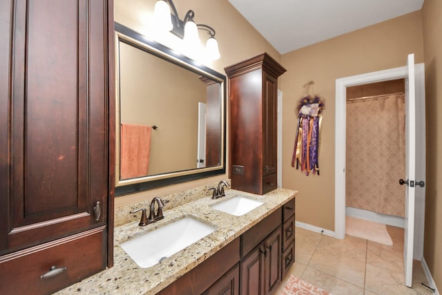 102 Stonecrop Pl, Montgomery, TX 77316 - bathroom featuring baseboards and double vanity