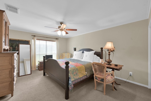 2117 Nantucket Dr, Houston, TX 77057 - bedroom featuring light carpet, a ceiling fan, and crown molding
