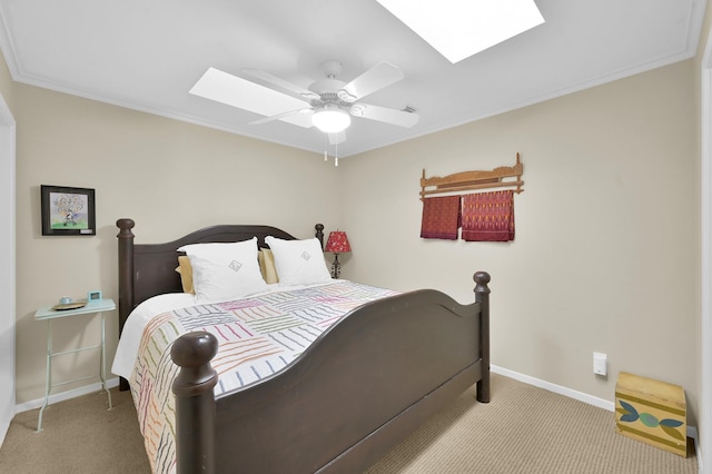 2117 Nantucket Dr, Houston, TX 77057 - bedroom featuring a skylight, carpet, crown molding, and a ceiling fan