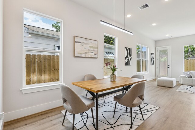 3720 Nathaniel Brown St, Houston, TX 77021 - dining space with light wood-style flooring and recessed lighting