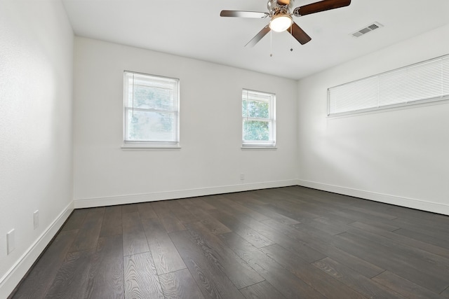 9226 Kapri Ln, Houston, TX 77025 - unfurnished room featuring dark wood-type flooring and a ceiling fan
