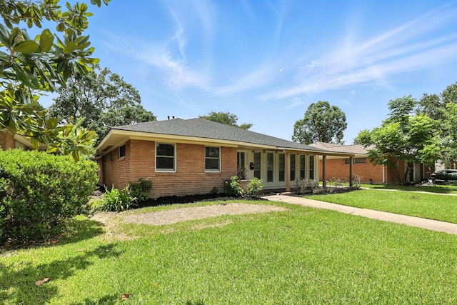 9226 Kapri Ln, Houston, TX 77025 - view of front of home with brick siding and a front lawn
