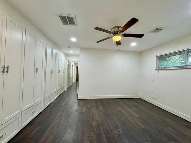 9226 Kapri Ln, Houston, TX 77025 - empty room featuring dark wood-style flooring, recessed lighting, and a ceiling fan