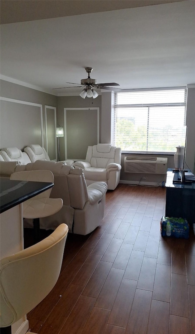 7510 Hornwood, Houston, TX 77036 - living room with ceiling fan, wood finished floors, and a wall unit AC