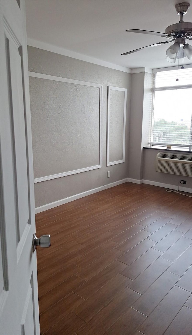 7510 Hornwood, Houston, TX 77036 - unfurnished room featuring ceiling fan, wood finished floors, and a wall mounted air conditioner