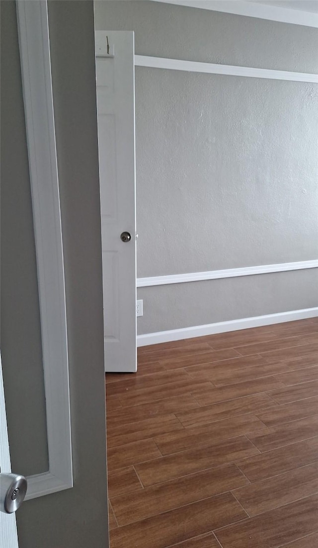 7510 Hornwood, Houston, TX 77036 - spare room with wood finished floors and baseboards