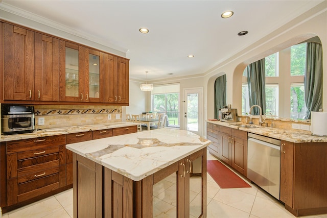 22315 Claysprings Ln, Katy, TX 77450 - kitchen with stainless steel dishwasher, arched walkways, brown cabinetry, a center island, and light tile patterned floors