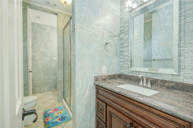 22315 Claysprings Ln, Katy, TX 77450 - full bathroom featuring a stall shower, vanity, and tile walls