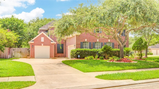 22315 Claysprings Ln, Katy, TX 77450 - traditional home with brick siding, a garage, and driveway