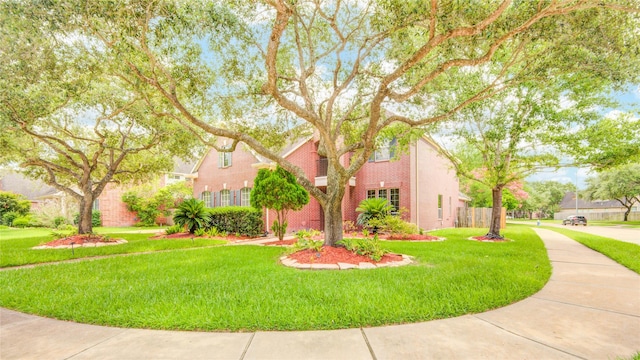 22315 Claysprings Ln, Katy, TX 77450 - view of property exterior with a yard