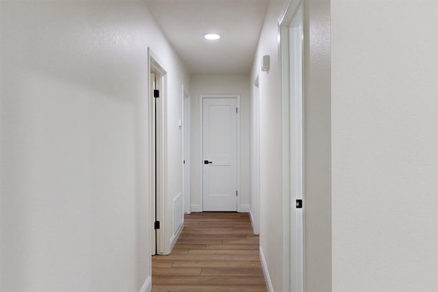 904 Dumas Dr, Bryan, TX 77803 - hall with light wood-type flooring and recessed lighting