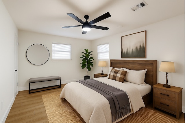 904 Dumas Dr, Bryan, TX 77803 - bedroom featuring light wood-type flooring and ceiling fan