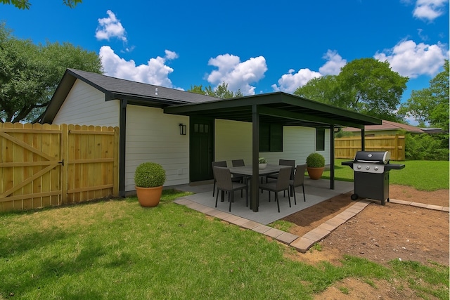 904 Dumas Dr, Bryan, TX 77803 - back of house featuring a patio area and a gate