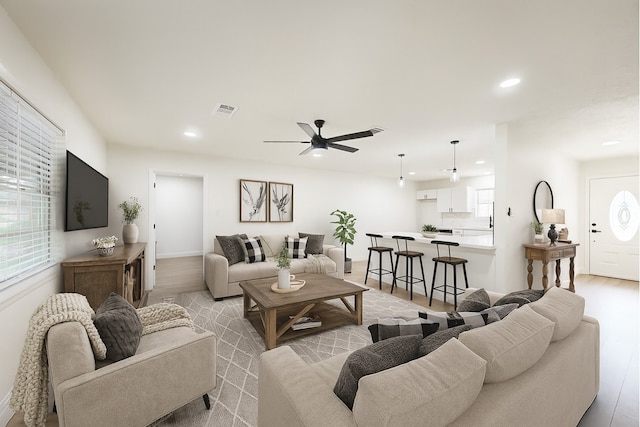 904 Dumas Dr, Bryan, TX 77803 - living area with recessed lighting, a ceiling fan, and light wood finished floors